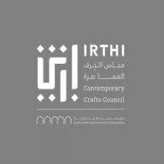 Logo of Irthi Contemporary Crafts Council featuring Arabic and English text with geometric design elements, seamlessly reflecting the elegance found in online fashion courses.