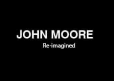 Sure, here is your description with British English spellings:

A black background with the text "JOHN MOORE" in large white letters and "Re-imagined" in smaller white letters underneath.