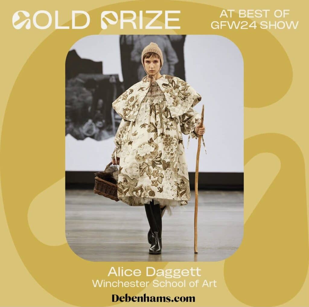 Model wearing a floral outfit and carrying a basket on a runway. Text reads "Gold Prize at Best of GFW24 Show, Alice Daggett, Winchester School of Art, Debenhams.com. Explore our online fashion courses to elevate your style.